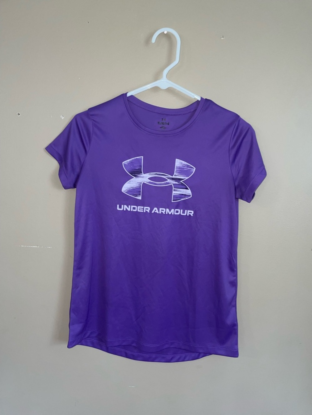 Under Armour “loose” dri-fit girls purple shirt/top size YLG